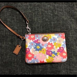 Muticolor Floral Coach Wristlet.